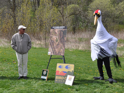 International Crane Foundation Co-founder George Archibald and Hope the Whooping Crane mascot present at Baraboo Wisconsin Bird City Designation Ceremony.