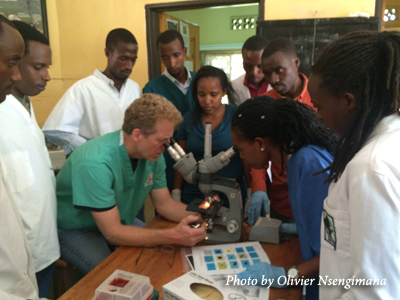 Dr. Barry Hartup works with wildlife veterinarians in Rwanda.