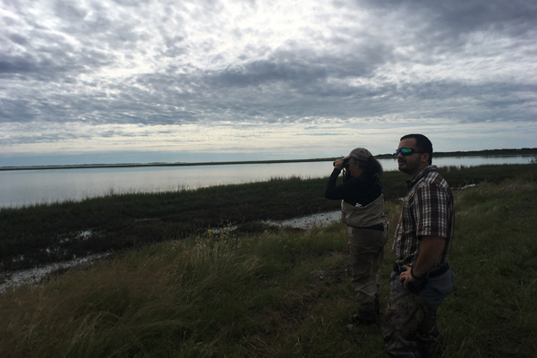 Liz and John surveying for Whooping Cranes.